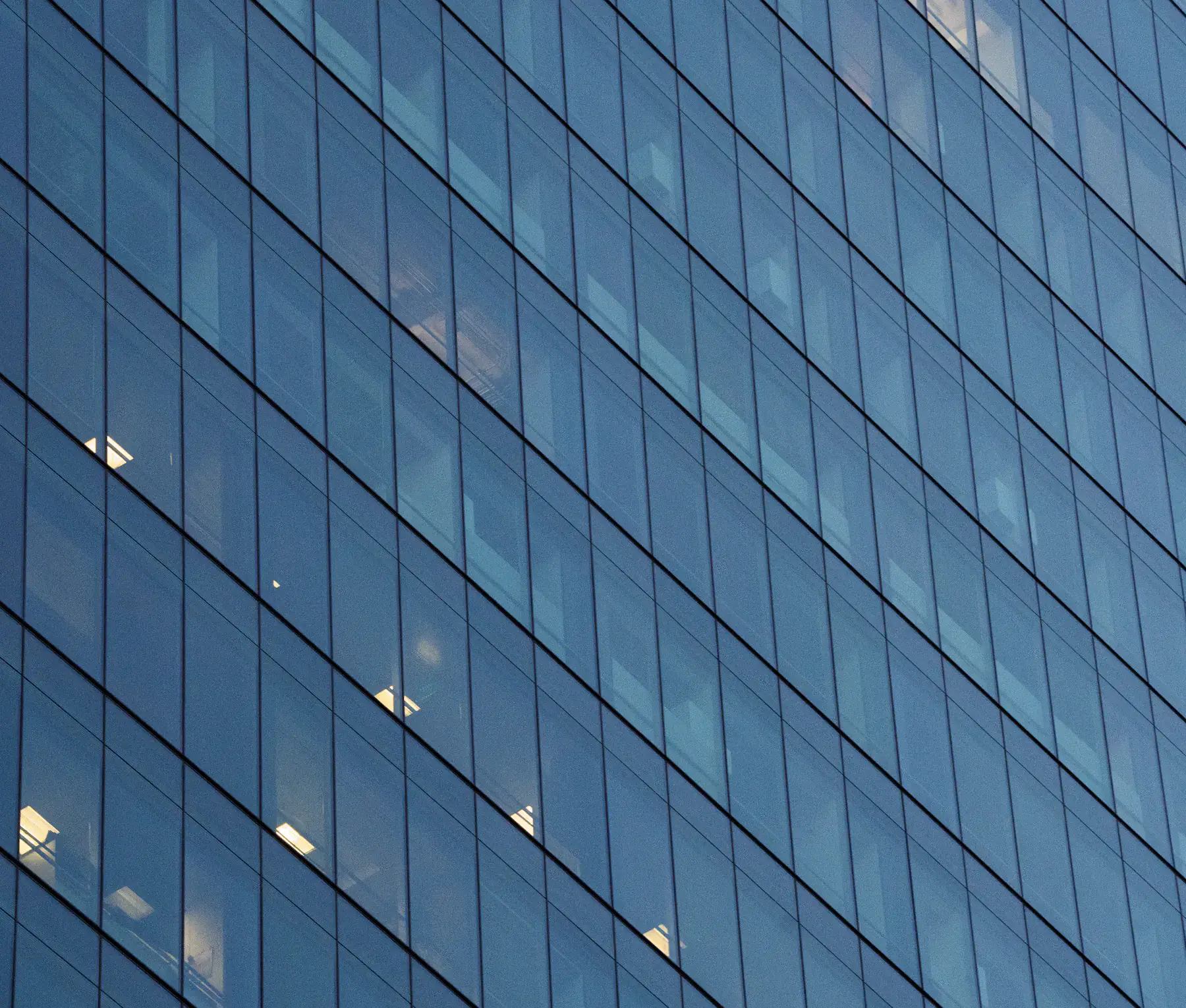 Geometric glass facade of a contemporary office building