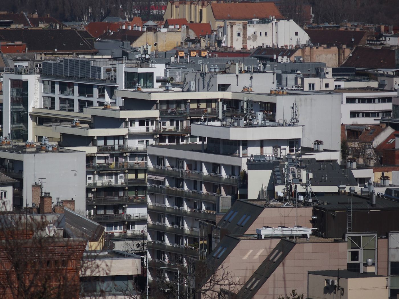 A dense contemporary city district with varied modern buildings